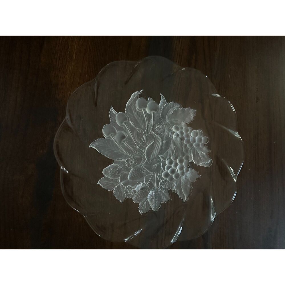 Vintage clear glass serving plate or bowl featuring an embossed fruit design.